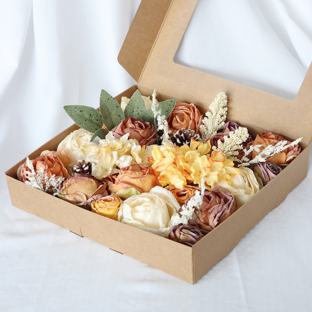 Boîte à fleurs de mariage roses orange et champagne