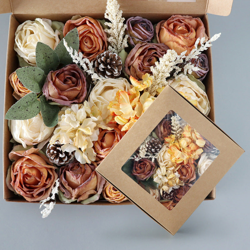 Boîte à fleurs de mariage roses orange et champagne