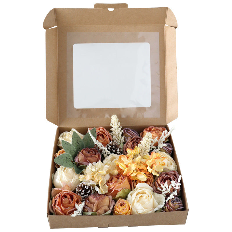 Boîte à fleurs de mariage roses orange et champagne