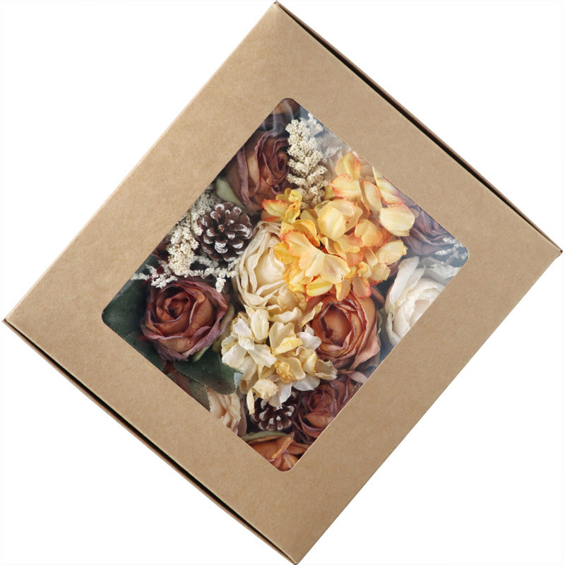 Boîte à fleurs de mariage roses orange et champagne