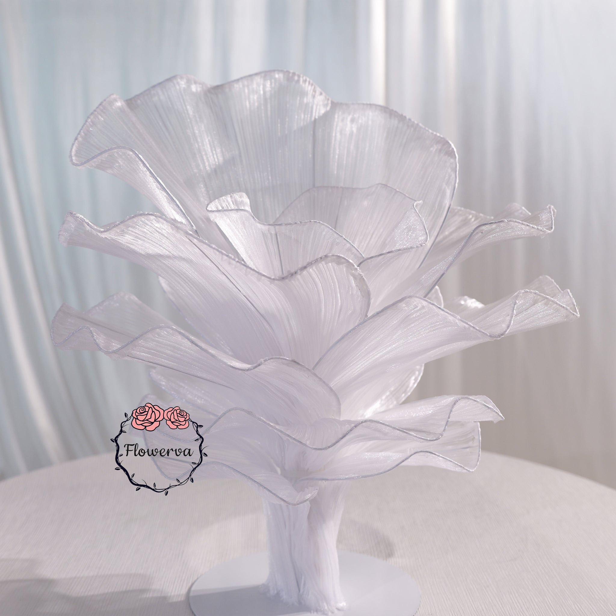 Close-up of handcrafted fabric flower centerpiece details