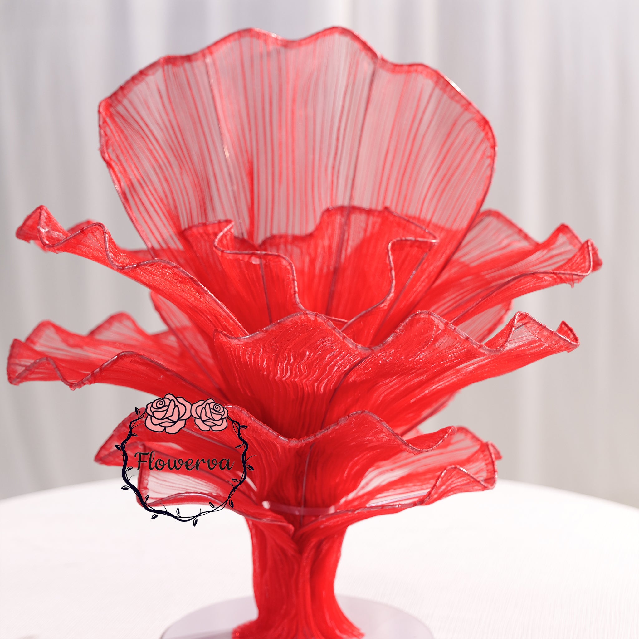 Close-up of handcrafted fabric flower centerpiece details