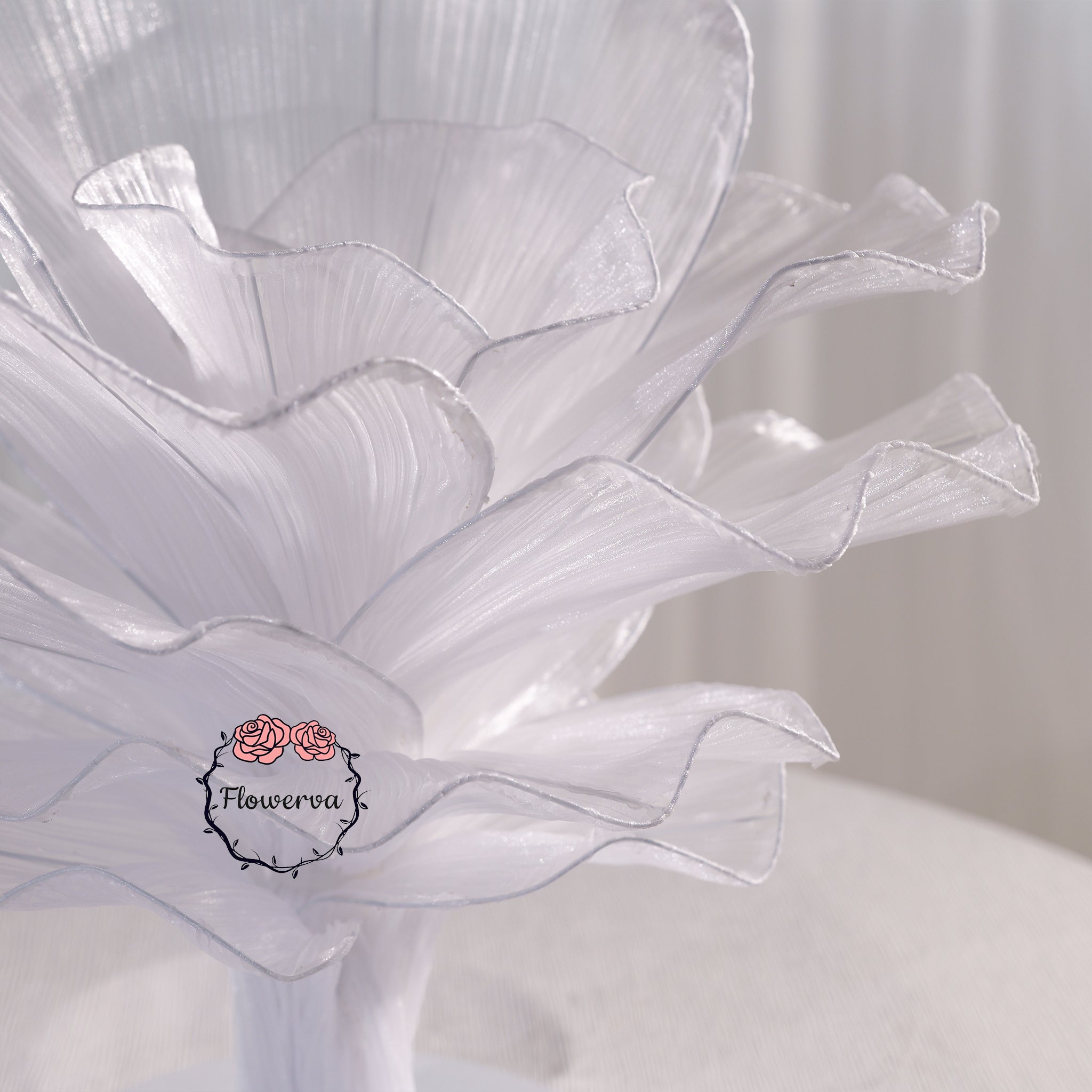 Close-up of handcrafted fabric flower centerpiece details